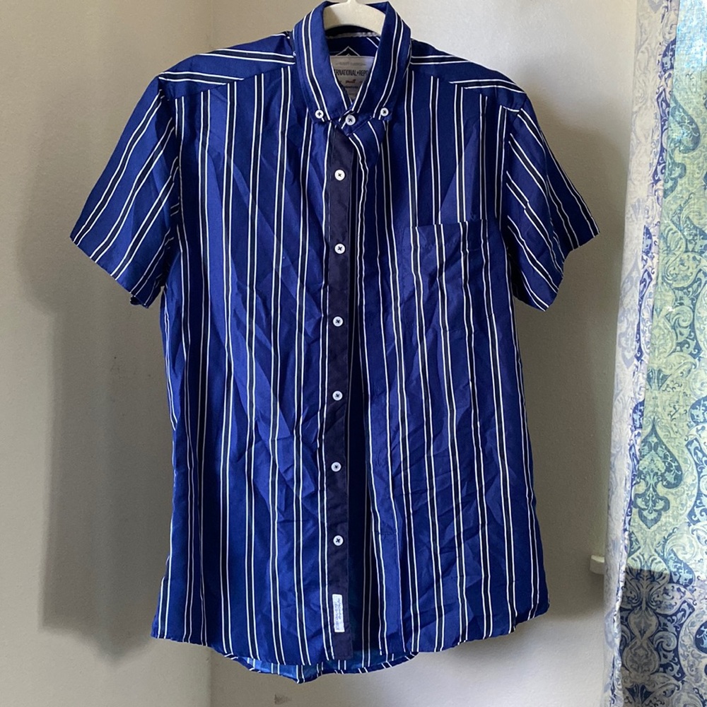 “International Report” Men’s Striped Shirt.